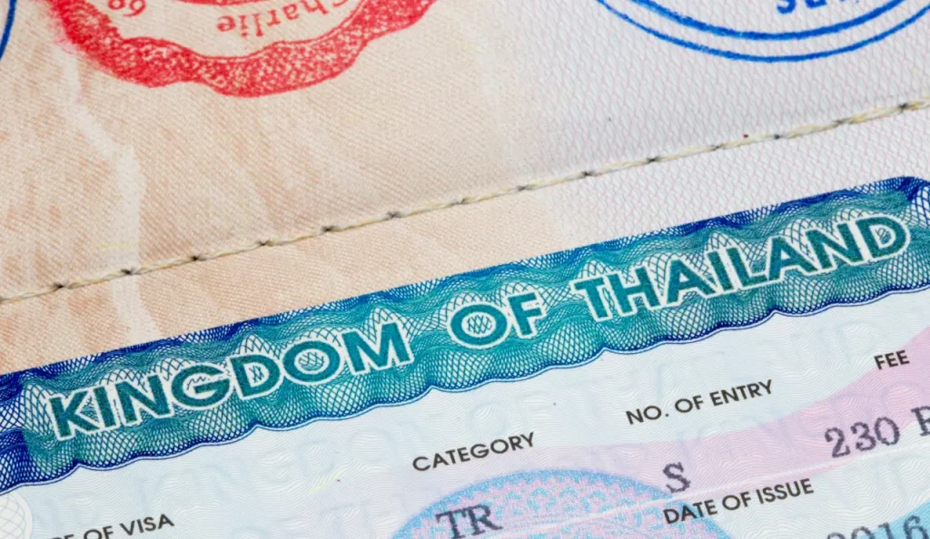 Ein Visum für Thailand in einem Reisepass